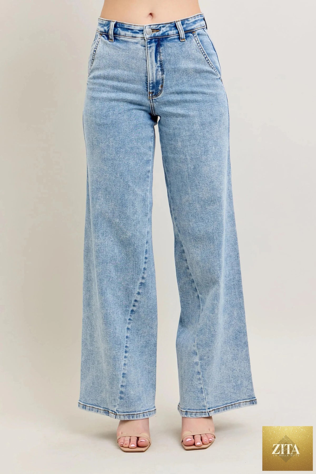 Wild and Free Boutique Judy Blue high waist wide leg jeans with skewed inseam, plus size, showcasing front and back views.