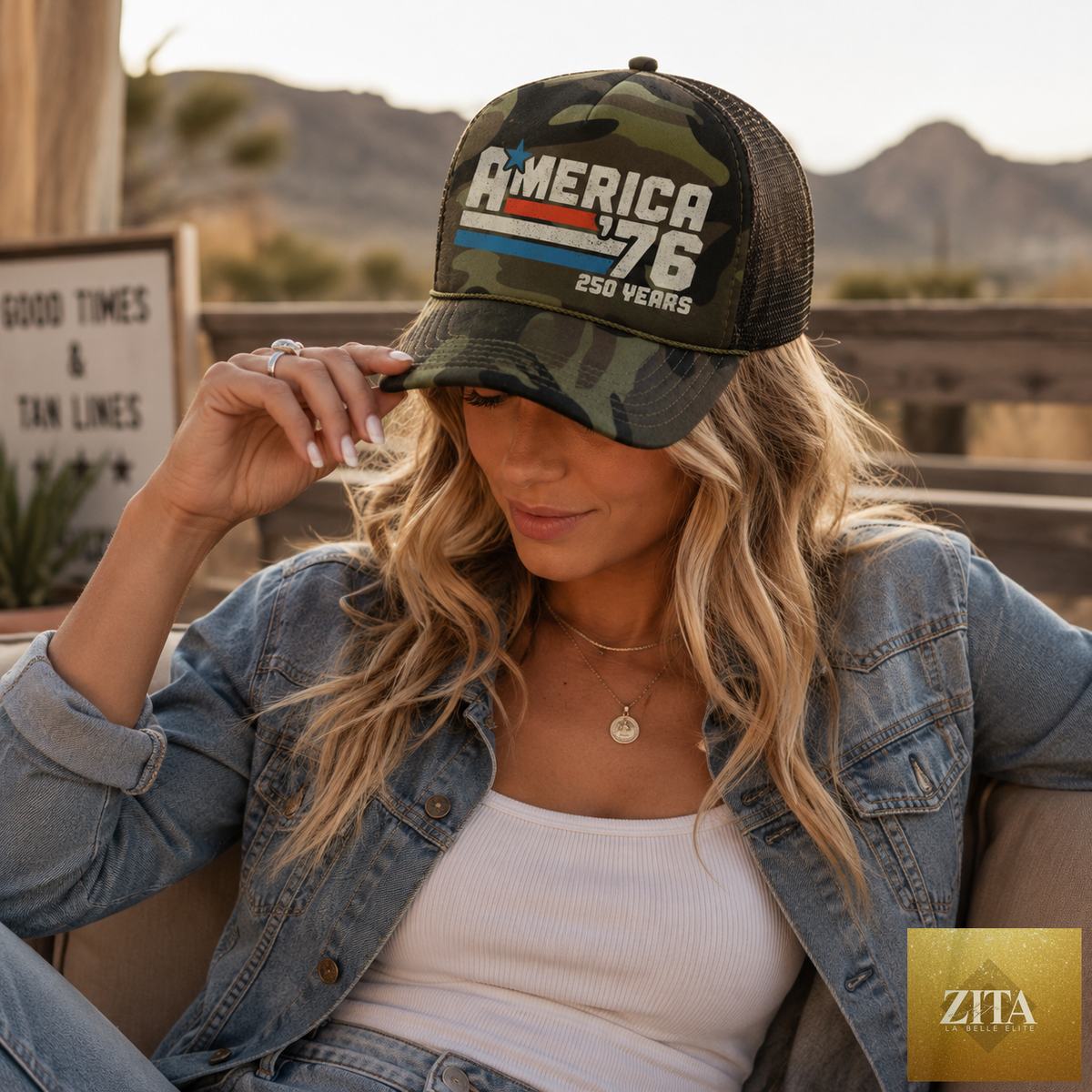 Carry Girl Gear America '76 Trucker hat in camo with limited edition 250 Years design, adjustable trucker style.