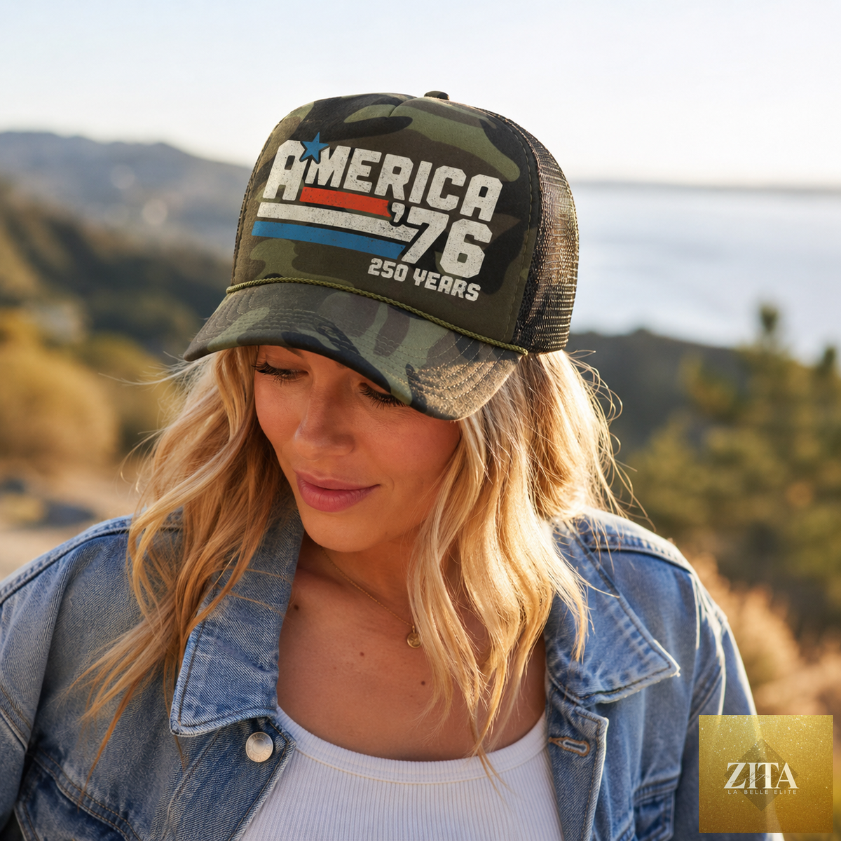 Carry Girl Gear America '76 Trucker hat with camouflage design, celebrating 250 years, limited edition trucker cap.