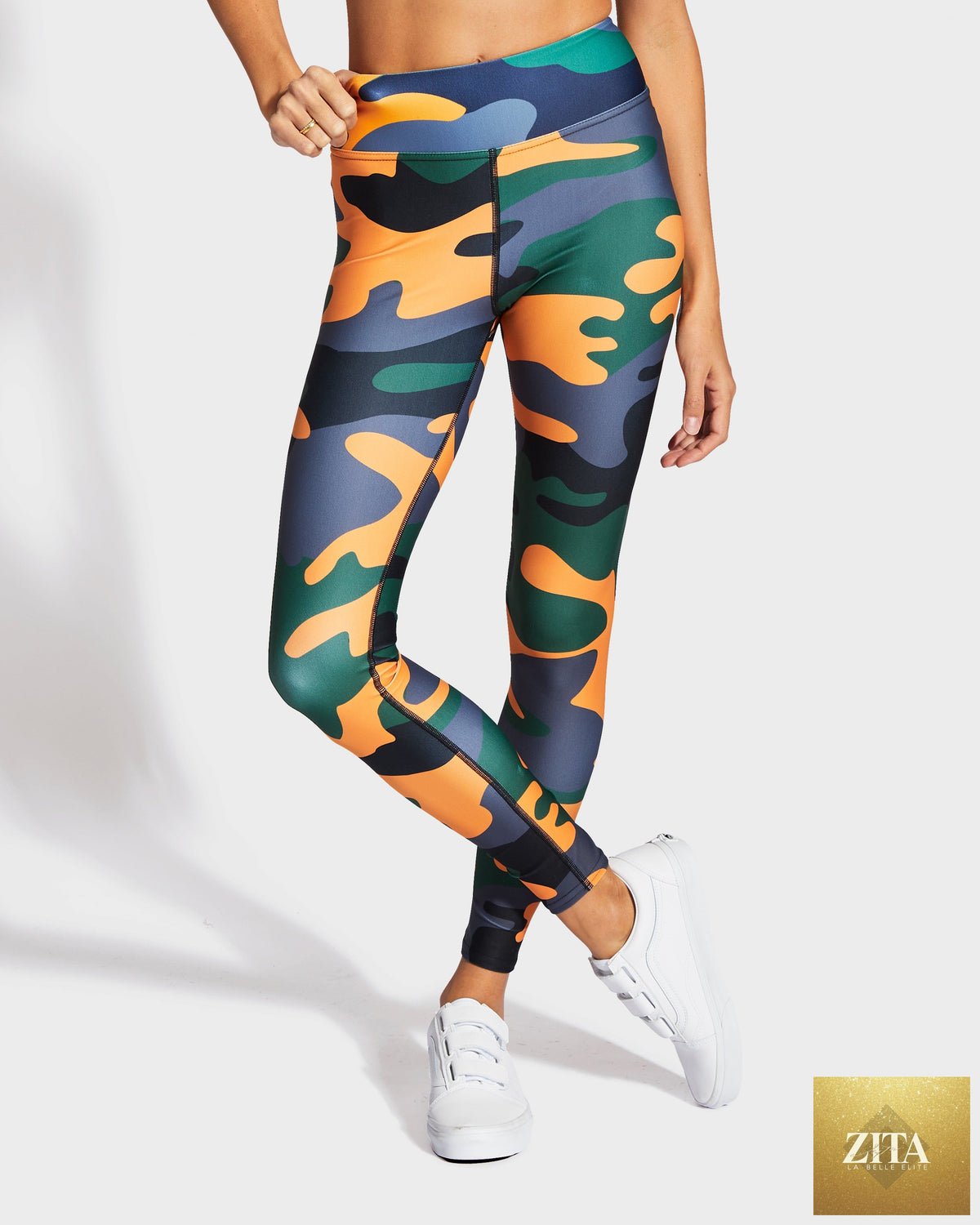 RUFFHAUS NYC Camo QT Orange yoga leggings with camouflage pattern, stretchy fabric, and comfortable fit for active wear.
