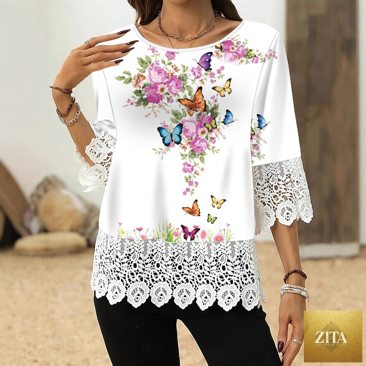 Printed patchwork three-quarter sleeve women's casual top by Zita La Belle Elite, loose fit pullover with colorful patchwork design.