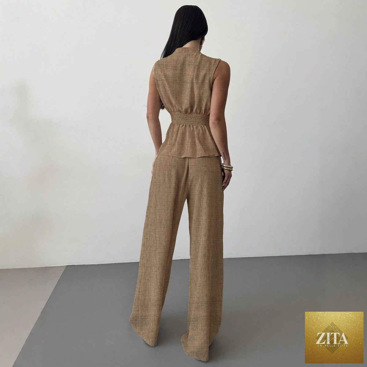 Women's lace-up V-neck vest and pants two-piece set by Zita La Belle Elite, featuring elegant, coordinated fashion ensemble.
