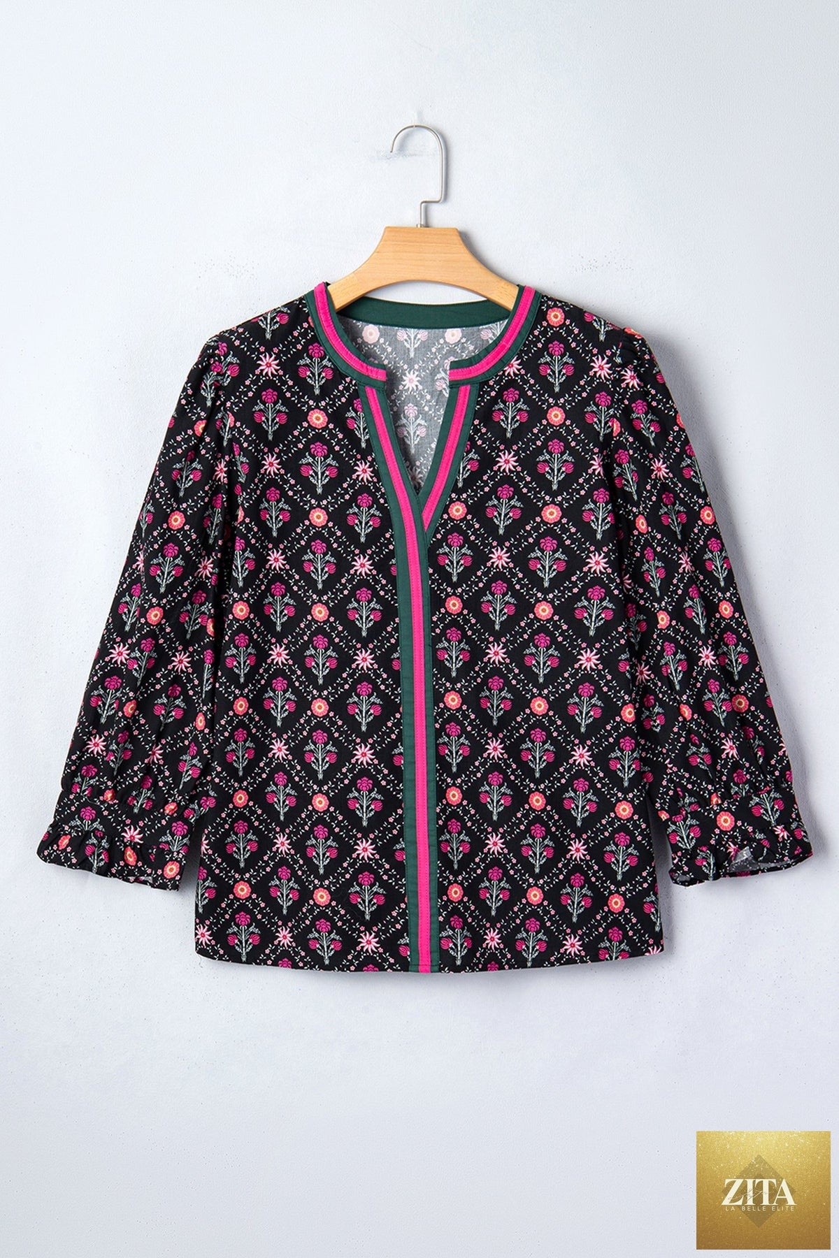 Black floral blouse with contrast V-neckline and bracelet sleeves, vintage style top by Wild and Free Boutique.