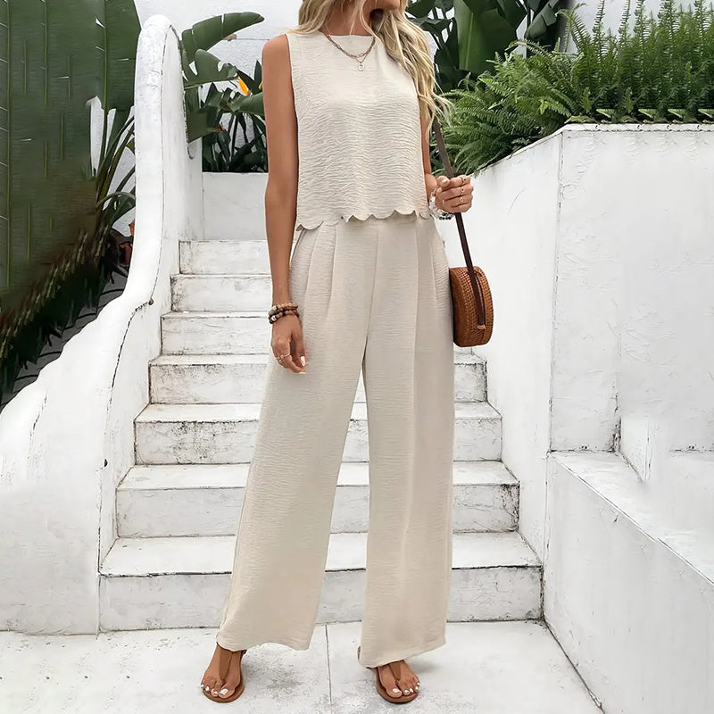Elegant FitiqueFit 2-piece casualwear set with sleeveless crop top and wide-leg pants, perfect for stylish, comfortable outfits.