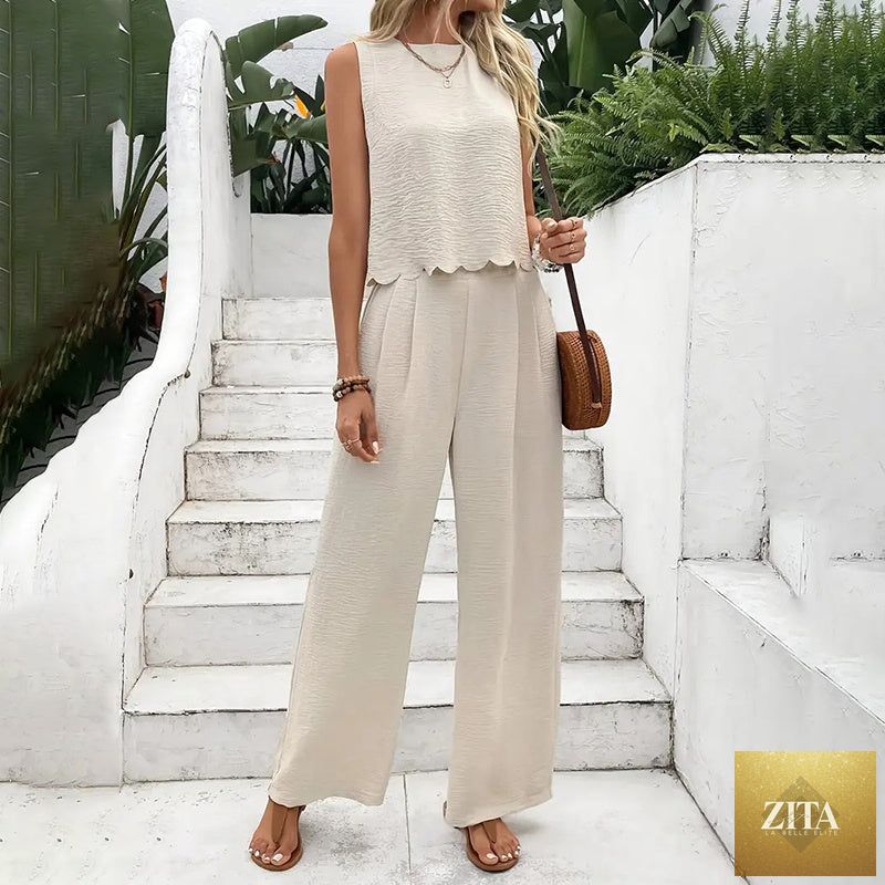 Elegant FitiqueFit 2-piece casualwear set with sleeveless crop top and wide-leg pants, perfect for stylish, comfortable outfits.