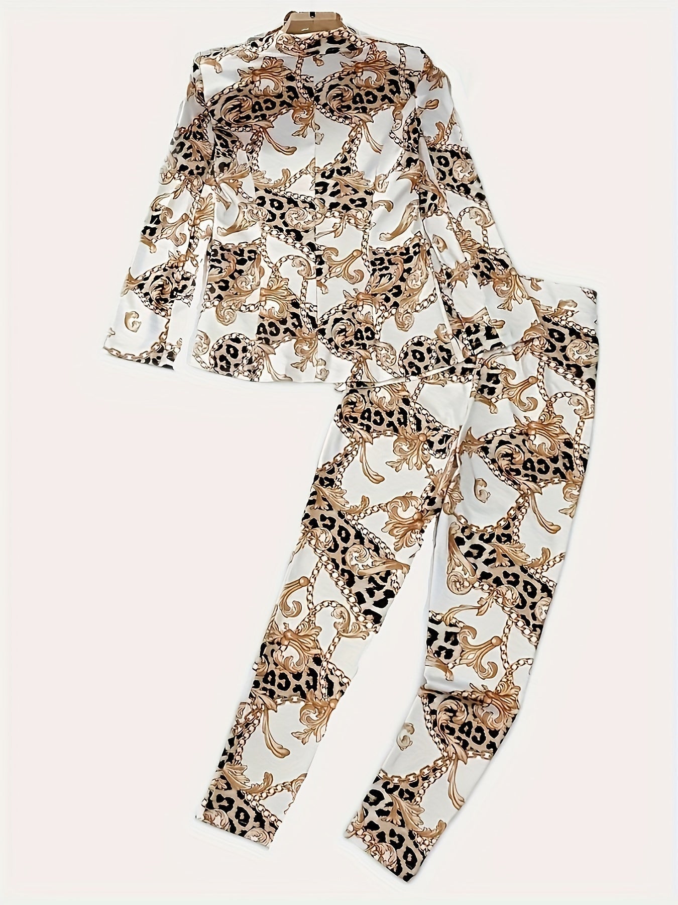 FitiqueFit geometric print two-piece blazer set for casualwear, featuring a tailored blazer and matching pants with bold geometric patterns.