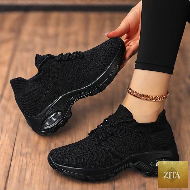 Women’s lightweight cushioned arch sneakers from Trendy Attic Store01 with breathable fabric and comfortable support.