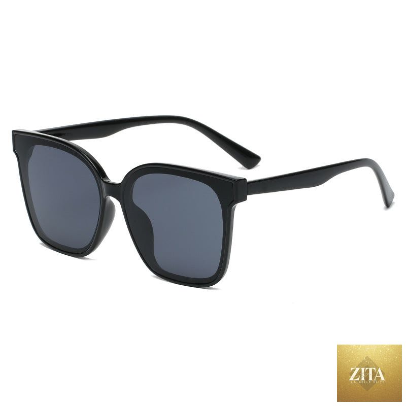 Retro INS style sunglasses by FitiqueFit featuring simple everyday fashion shades with rounded frames and dark tinted lenses.