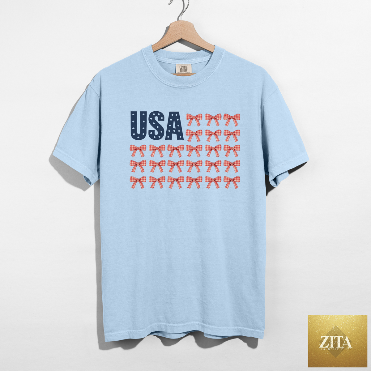 Hey Jude Graphic Tees USA Bow Flag Graphic Tee featuring patriotic gingham bows on chambray fabric.