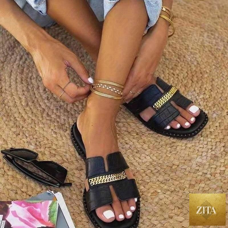 Stevvex women's flat flip flops with double chain design, strappy style, casual and beach-ready for comfortable summer wear.