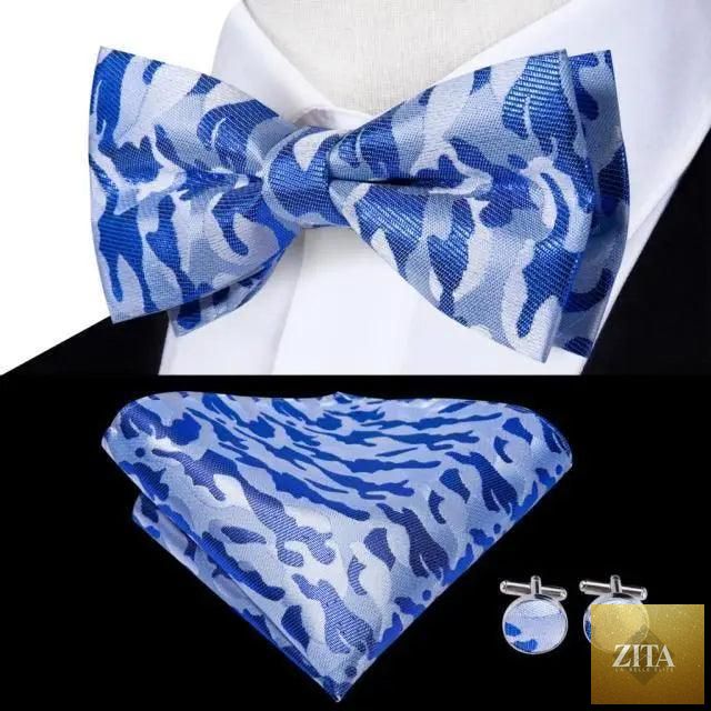 Elegant green silk bow tie set with matching pocket square and cufflinks for men, ideal for weddings and formal events.