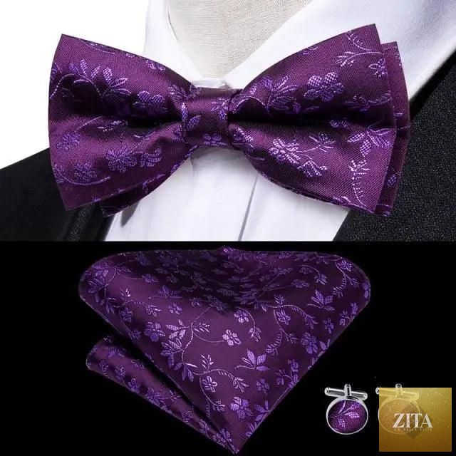 Elegant green silk bow tie with matching pocket square and cufflinks set, perfect for weddings or formal events.