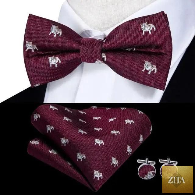 Green silk butterfly bow tie with matching pocket square and cufflinks set, stylish and elegant for wedding or formal occasions.