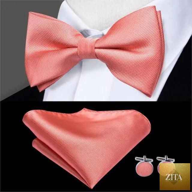 Elegant green silk bow tie set for men with matching pocket square and cufflinks, ideal for weddings and formal events.