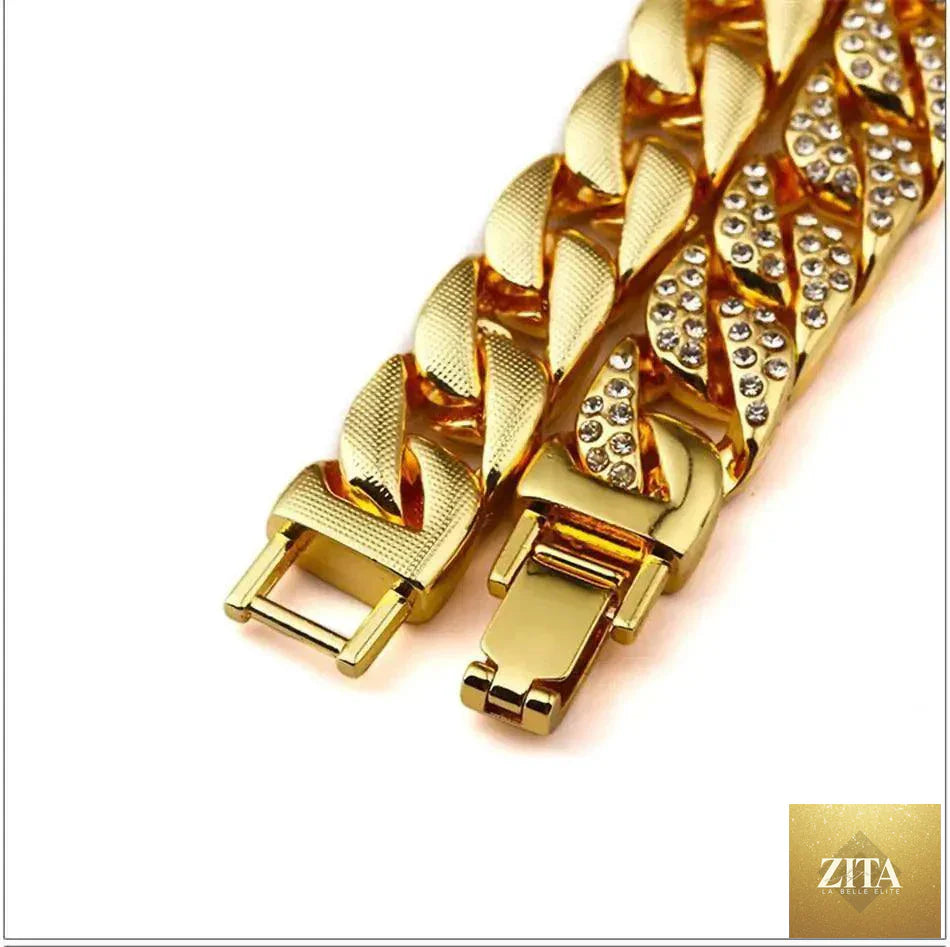 Mandotos Clyde Elegance Gold Bracelet featuring a sleek, polished gold design with intricate detailing.