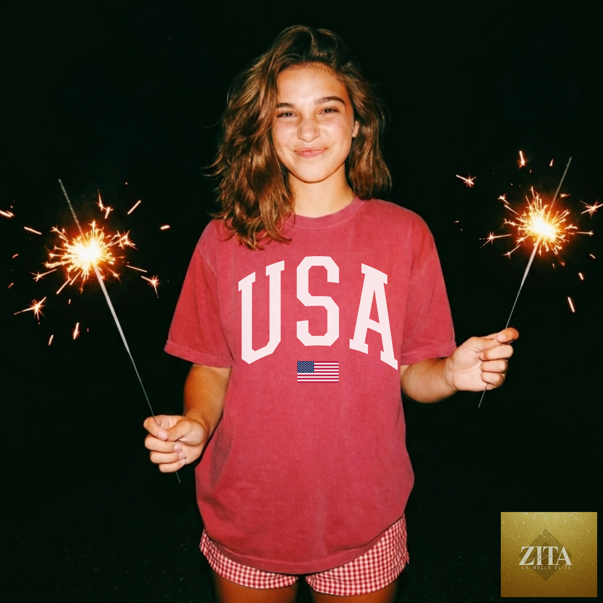 White USA Varsity Graphic Tee with patriotic red and blue lettering from Hey Jude Graphic Tees, featuring a bold American flag design.