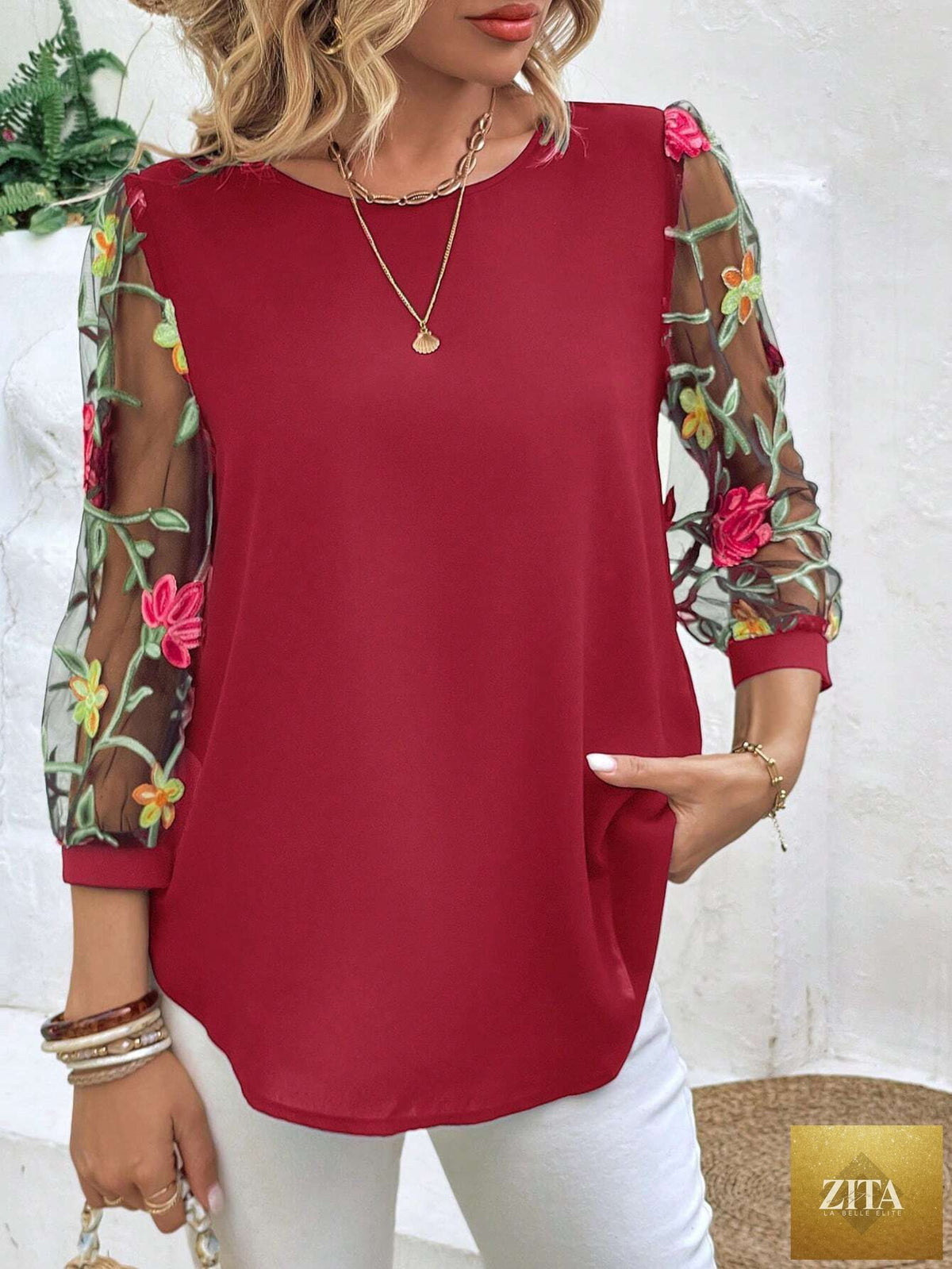 Women's mesh patchwork three-quarter sleeve casual top by Zita La Belle Elite, featuring stylish mesh and fabric patchwork detail.
