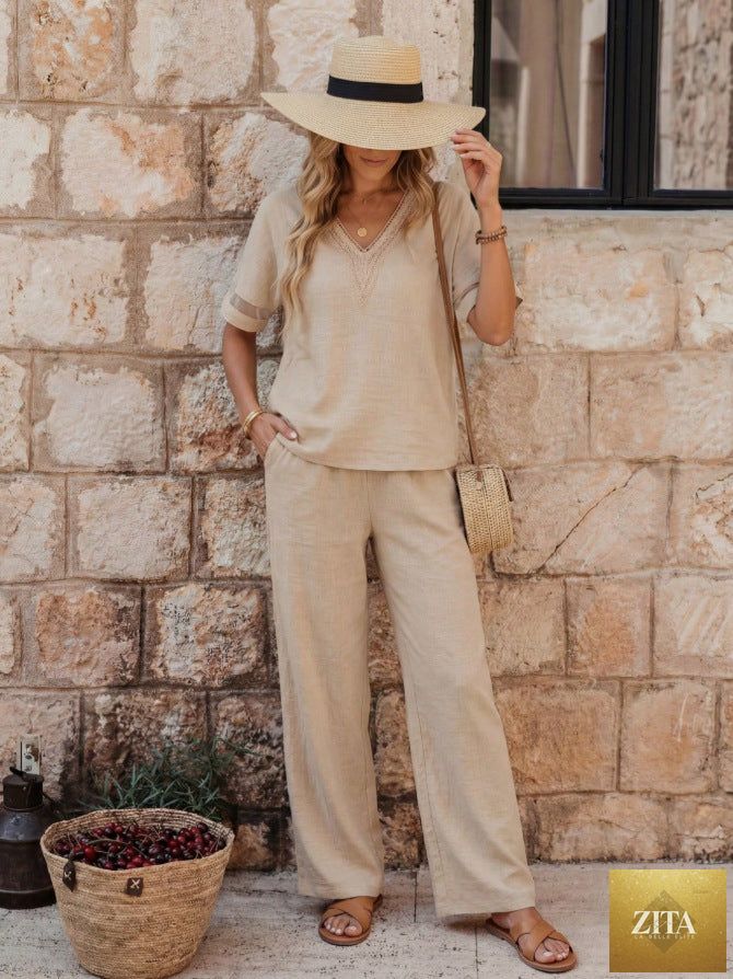 Women's embroidered V-neck top and wide-leg pants set by Zita La Belle Elite in five colors, featuring intricate embroidery and relaxed fit.