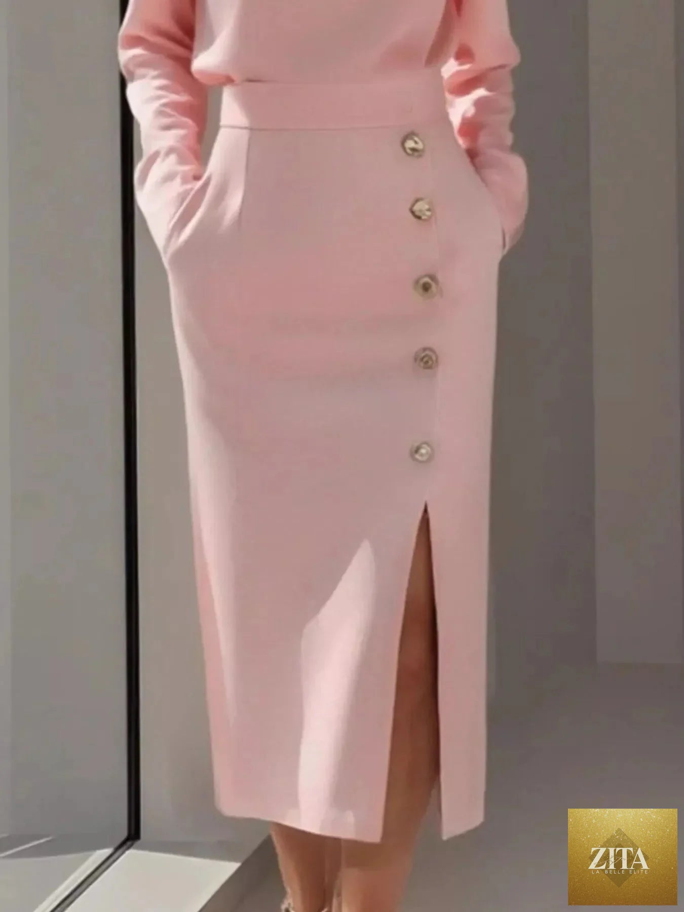 Long sleeve button detail midi dress with side slit by Shopiebay, featuring a sleek silhouette and elegant design.
