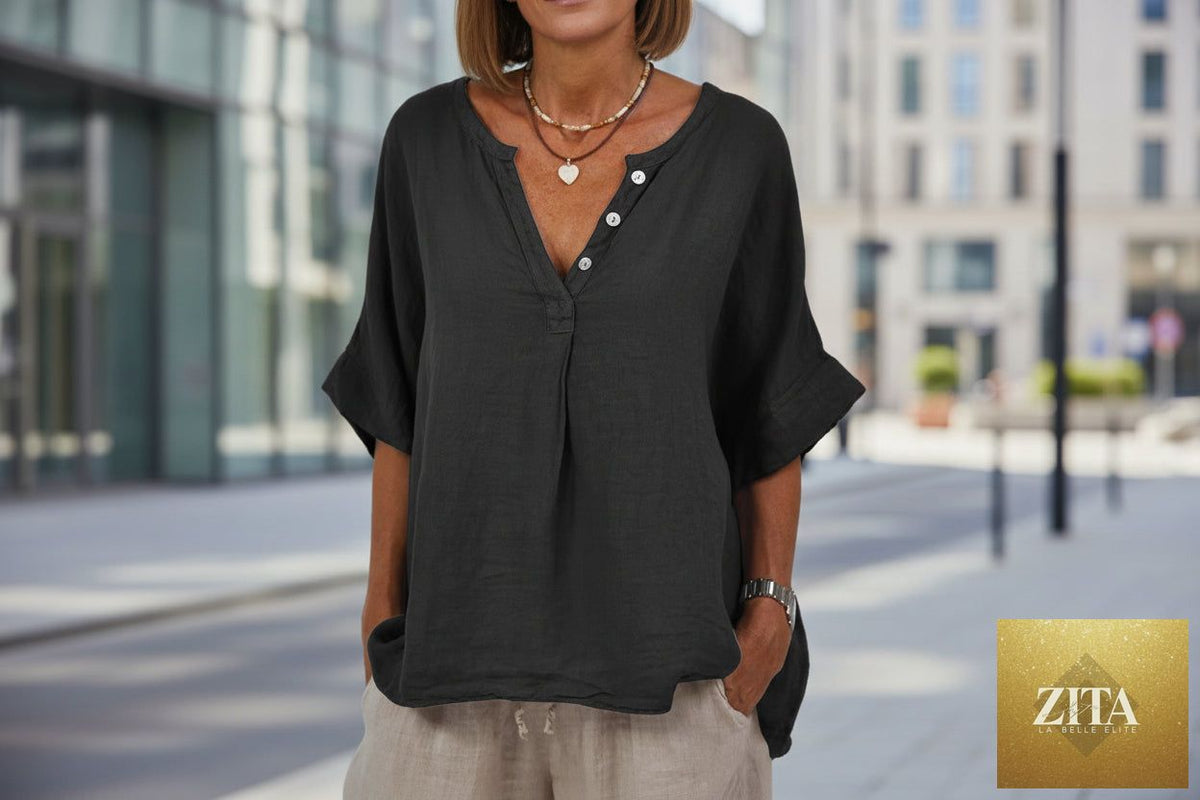 Women's cotton linen V-neck button-up shirt by Zita La Belle Elite, casualwear, shown in soft beige fabric with long sleeves.