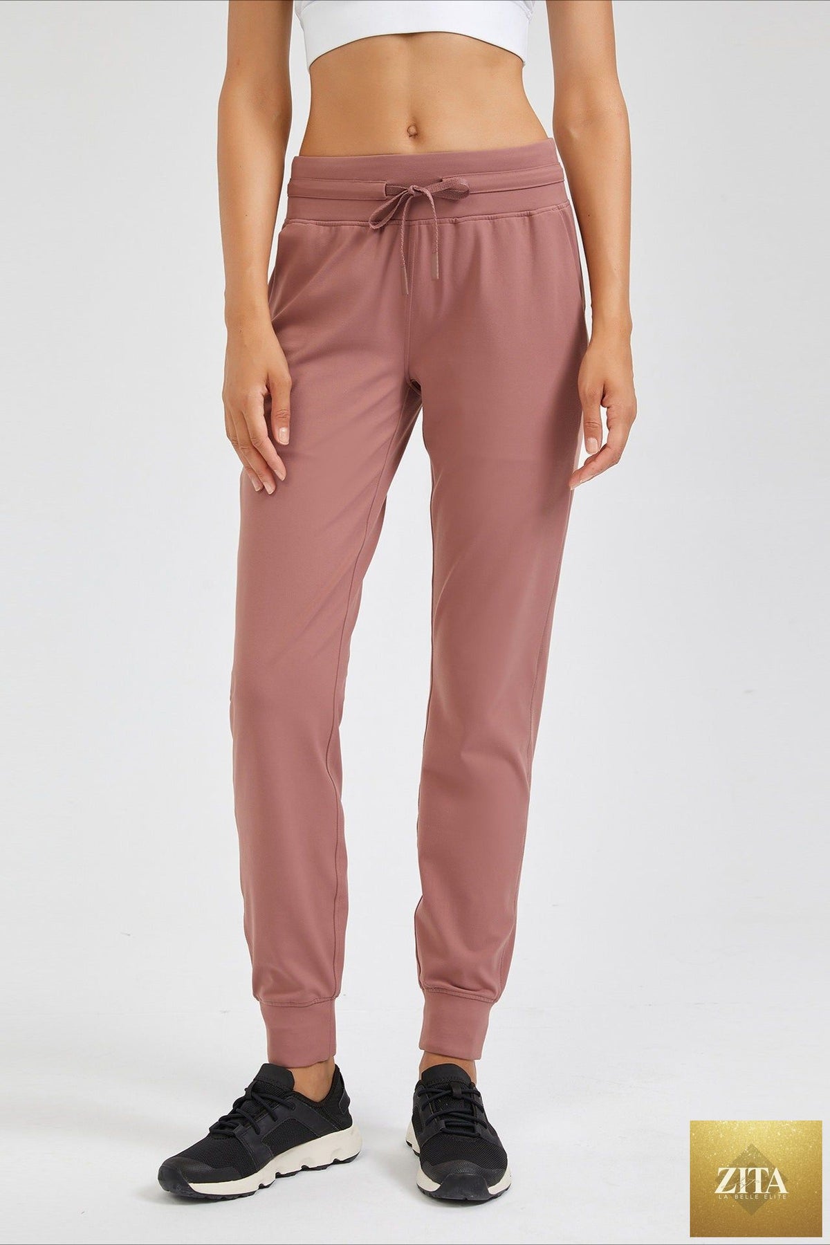 Women's high waist tapered fitness leggings by SHOMICOBOUTIQUE, featuring a snug fit and stretchy fabric for workout comfort.