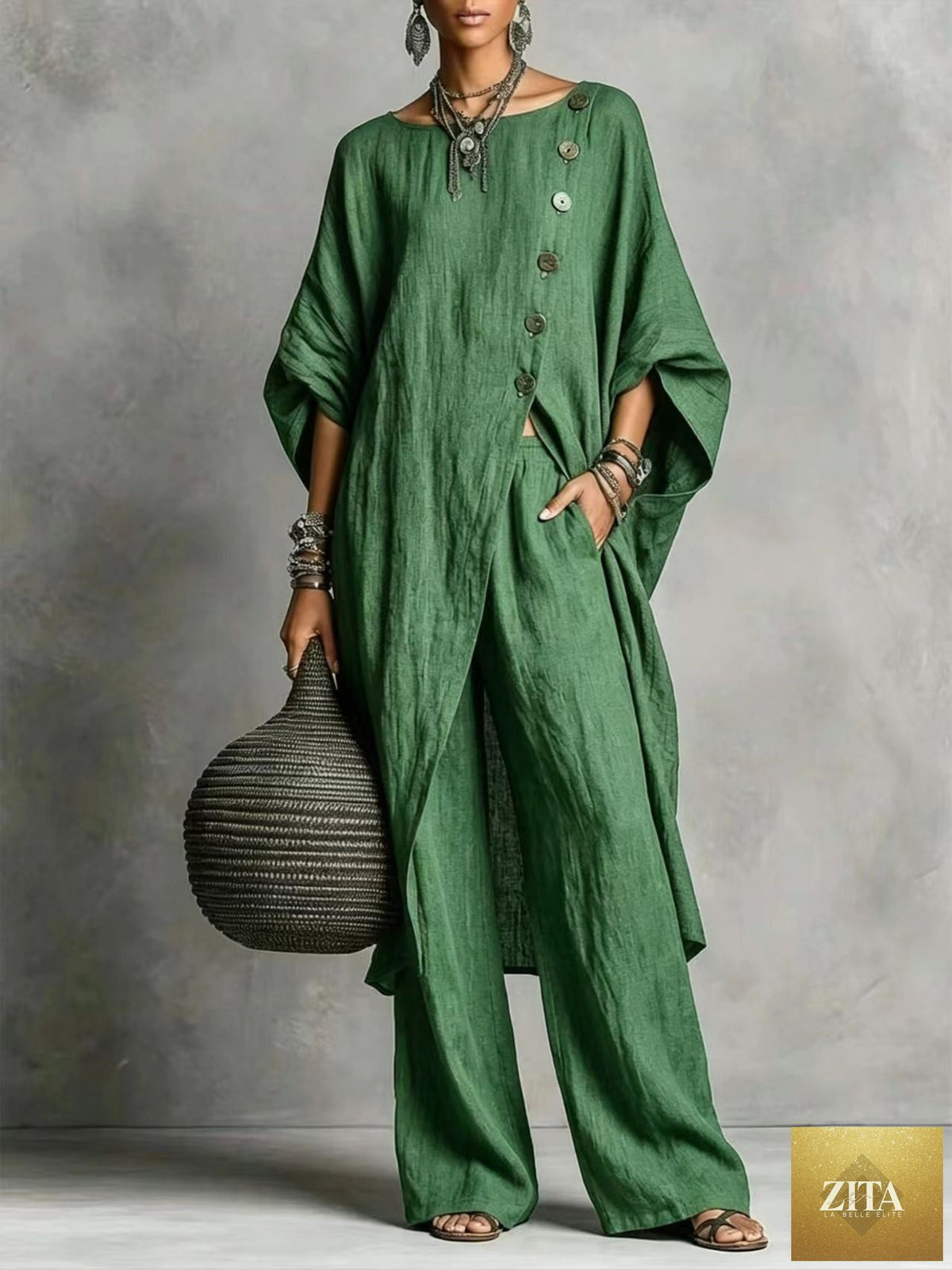 Women's casualwear set by Zita La Belle Elite featuring a drop shoulder, three-quarter sleeve irregular shirt and matching pants.