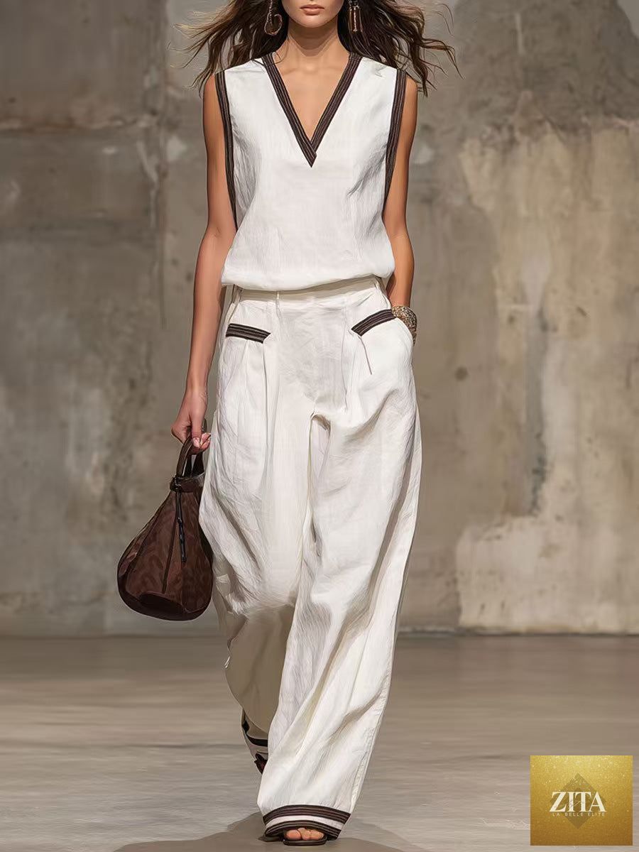 Women's minimalist sleeveless two-piece casualwear set by FitiqueFit, featuring a simple top and matching skirt in neutral fabric.