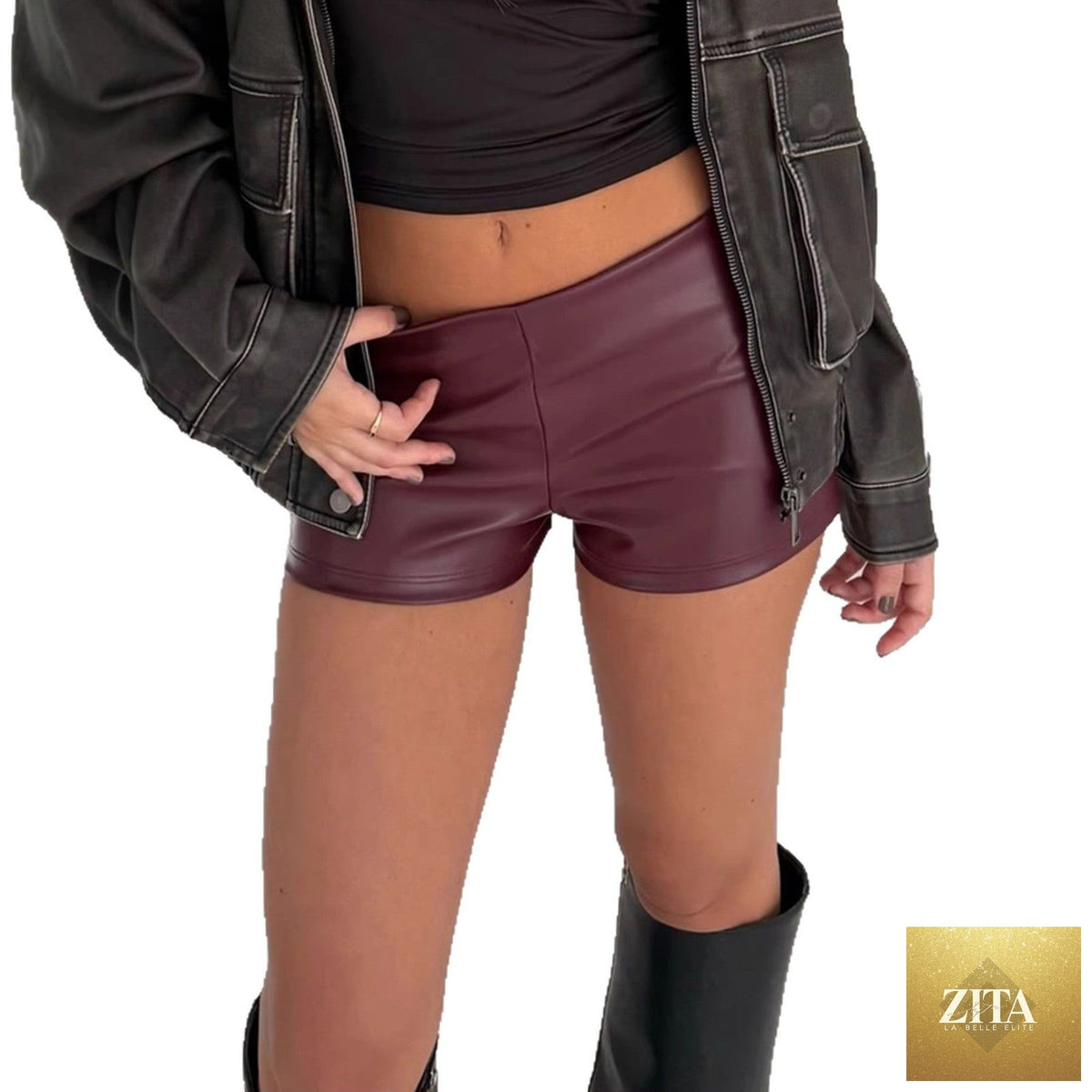 Black leather pants for women, slim-fit casual fashion, shown on a model with a modern, stylish look.