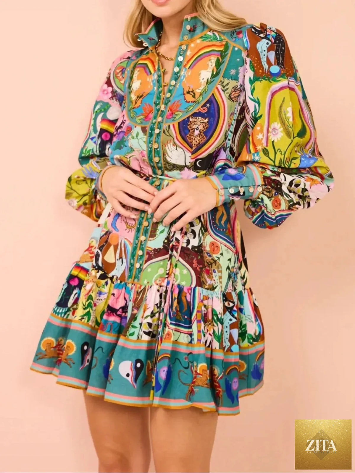Printed long sleeve mini dress with belt by Shopiebay, featuring a stylish design and fitted silhouette in the image.