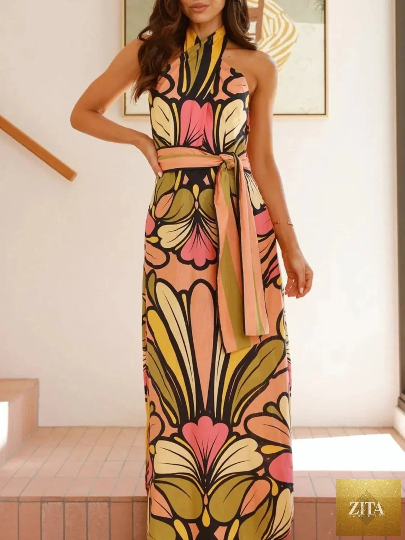 Printed halter neck maxi cami dress by Shopiebay featuring a flowy silhouette and vibrant floral pattern.