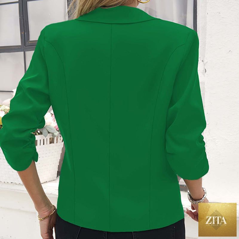 Plus size women’s office blouse by FitiqueFit, casualwear style with a relaxed fit, featuring a button-up front and long sleeves.