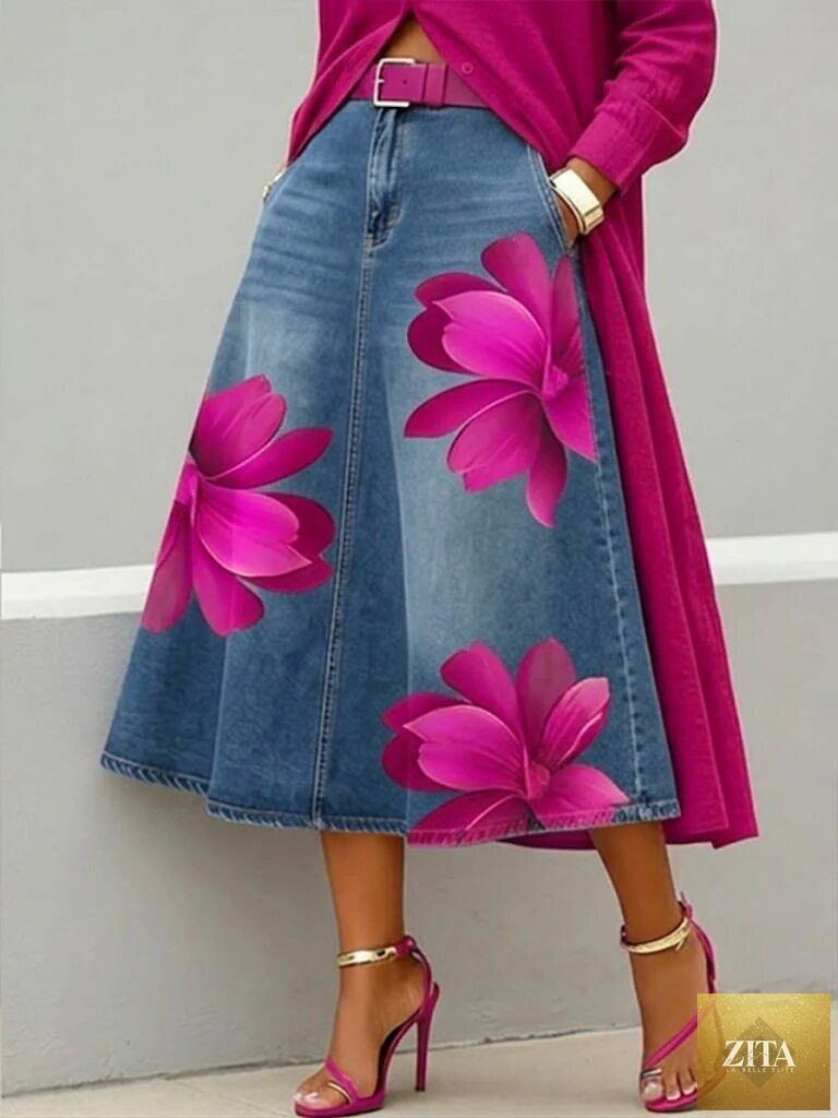 Women's floral print denim-style boho A-line midi skirt by FitiqueFit, featuring a flowy silhouette and vibrant floral pattern.