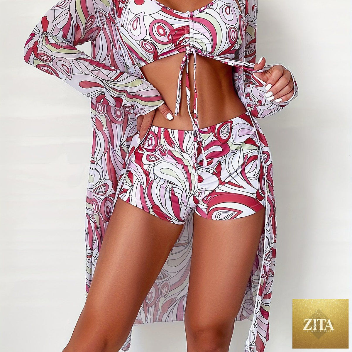 Stevvex Modern Geo 3-Piece bikini set with vibrant geometric print, V-neck top, boxer shorts bottoms, and long sleeve cover shirt.