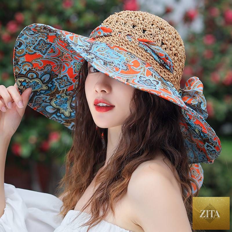 Women's patterned straw beach sun hat with round crown, UV protection, ideal for summer, by Zita La Belle Elite.