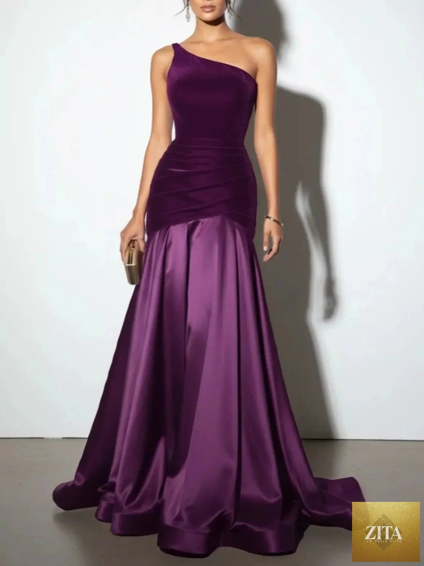 Shopiebay single shoulder floor-length dress with elegant flowing fabric and a fitted bodice, perfect for formal occasions.