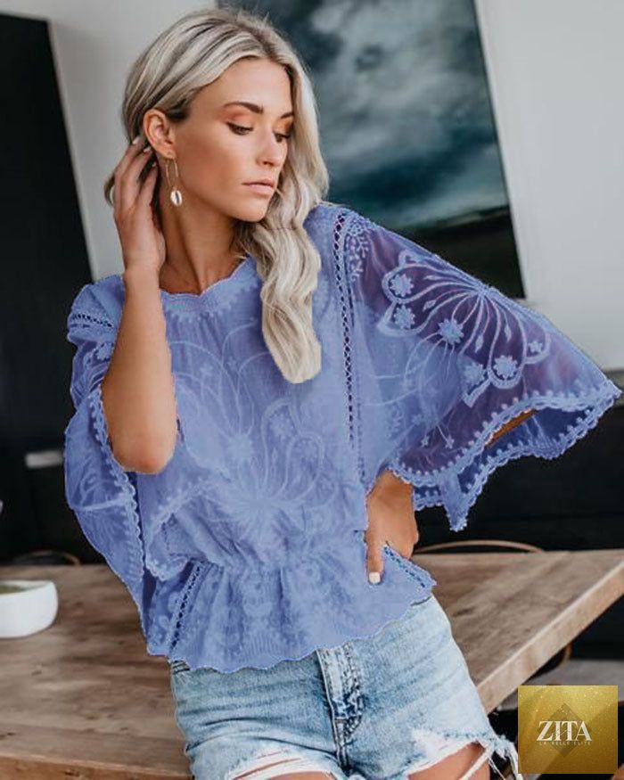 Women’s short sleeve lace trim batwing top from FitiqueFit, casualwear with delicate lace details and a relaxed fit.