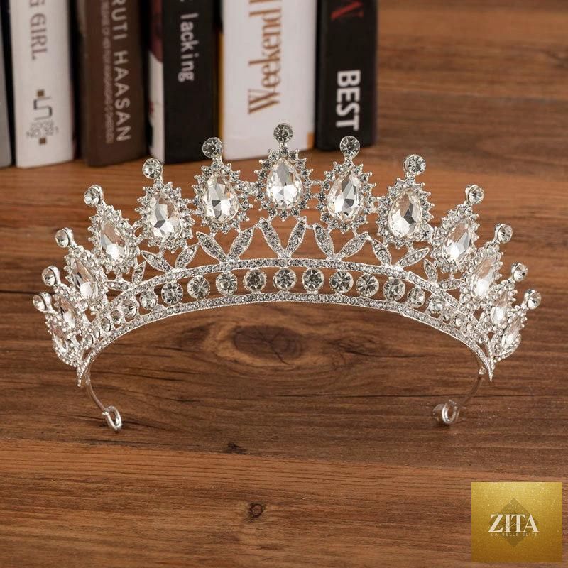 Elegant bridal crown made of alloy and diamonds, featuring intricate design and sparkling gemstones, perfect for wedding fashion.