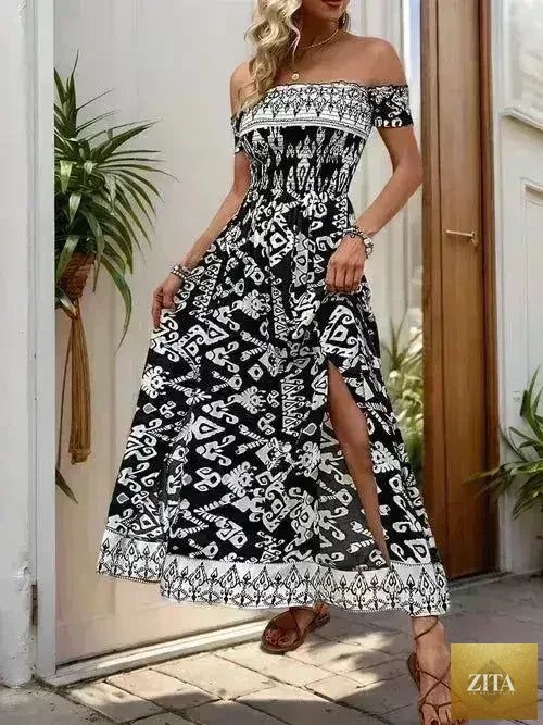 Flowy off-shoulder slit dress from Femstylo, made of lightweight viscose with a relaxed fit and elegant draped design.