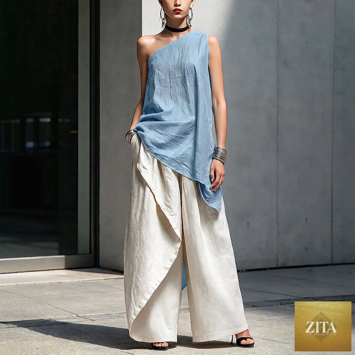Women's one-shoulder asymmetric sleeveless top by Zita La Belle Elite, shown in a stylish and modern design.