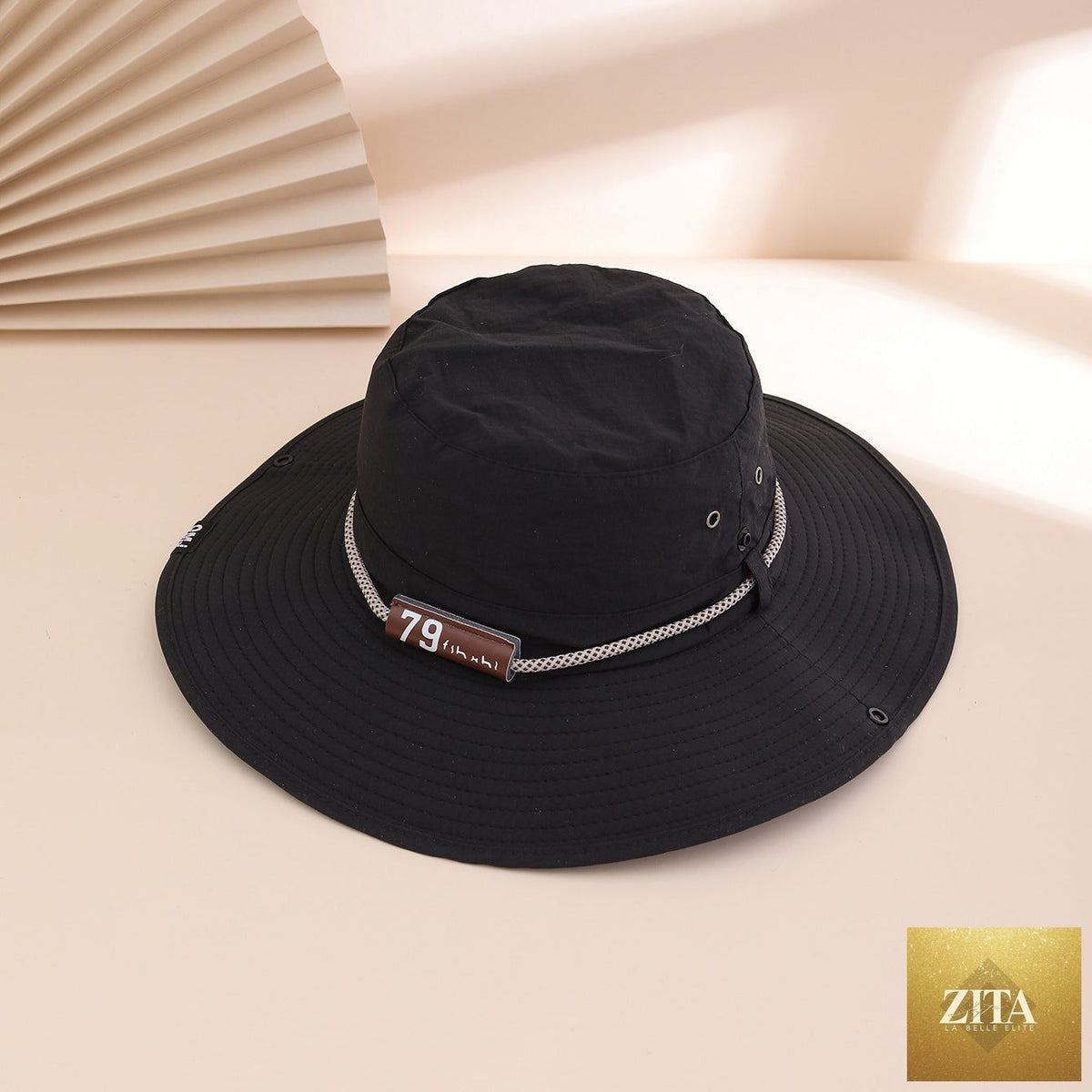 Wide-brim leather patch fisherman hat by Zita La Belle Elite, featuring UV sun protection and outdoor-ready style.