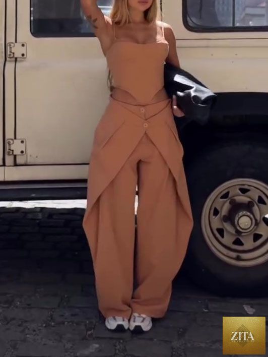 Zita La Belle Elite camel spaghetti strap corset top and wide-leg pants set, casualwear, model wearing it outdoors.