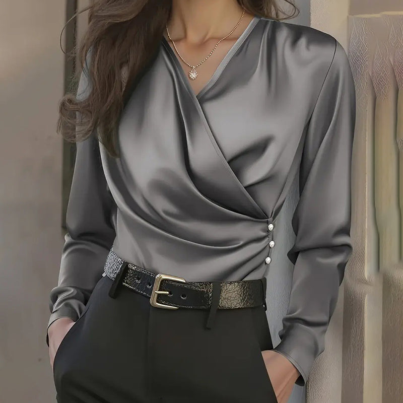 Women's elegant cross V-neck blouse by FitiqueFit with ruffle details and button accents, perfect for office casualwear.