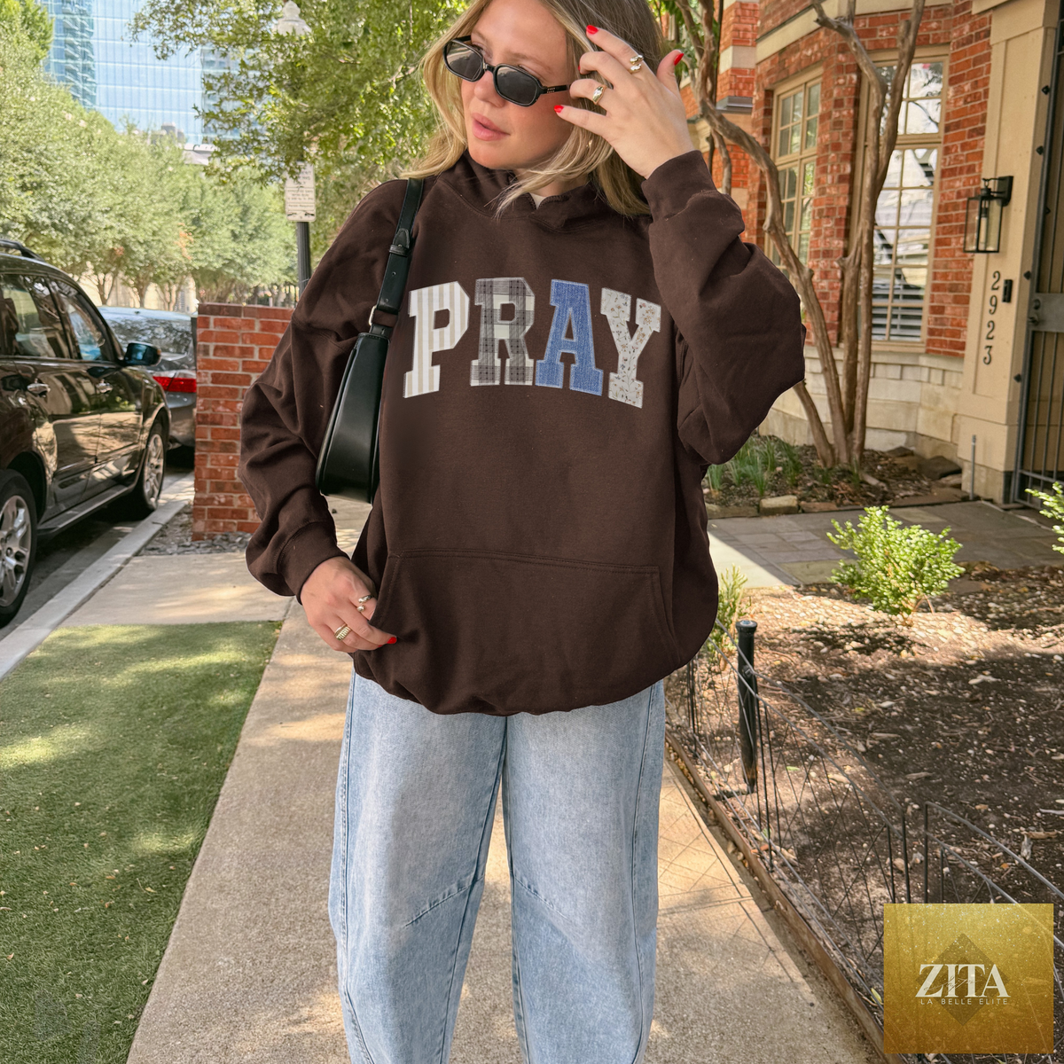 Dark chocolate PRAY patchwork hoodie by Zita La Belle Elite, featuring a faith-inspired cozy sweatshirt design.