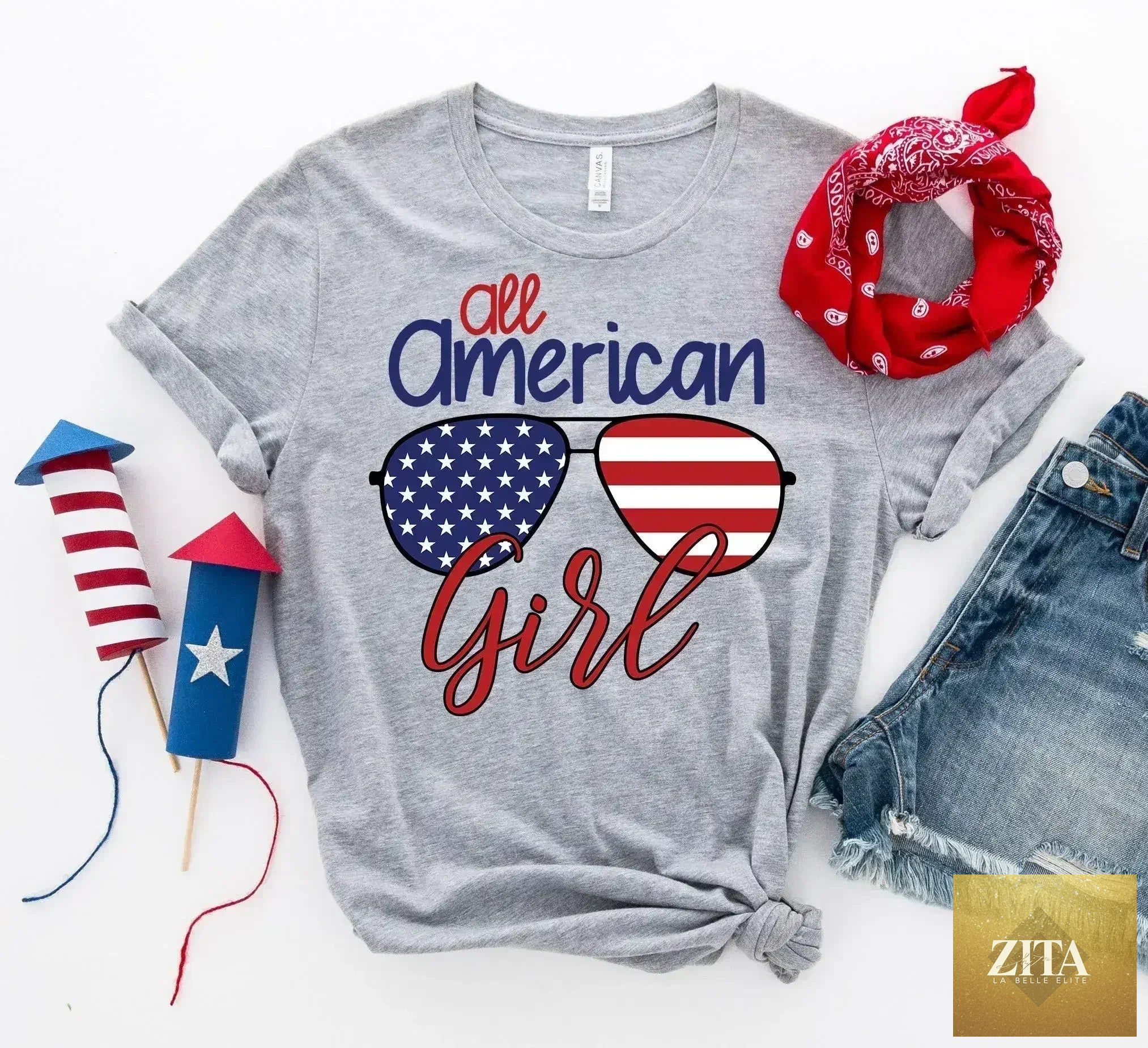 Femstylo All American Sunglasses printed girl T-shirt by Bella Canvas, featuring colorful graphic design on soft fabric.