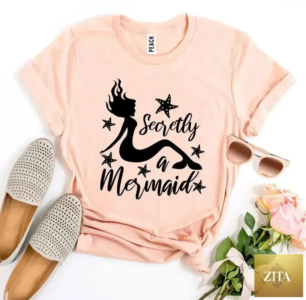 Femstylo Secretly a Mermaid T-shirt featuring a colorful mermaid design on a casual cotton T-shirt.