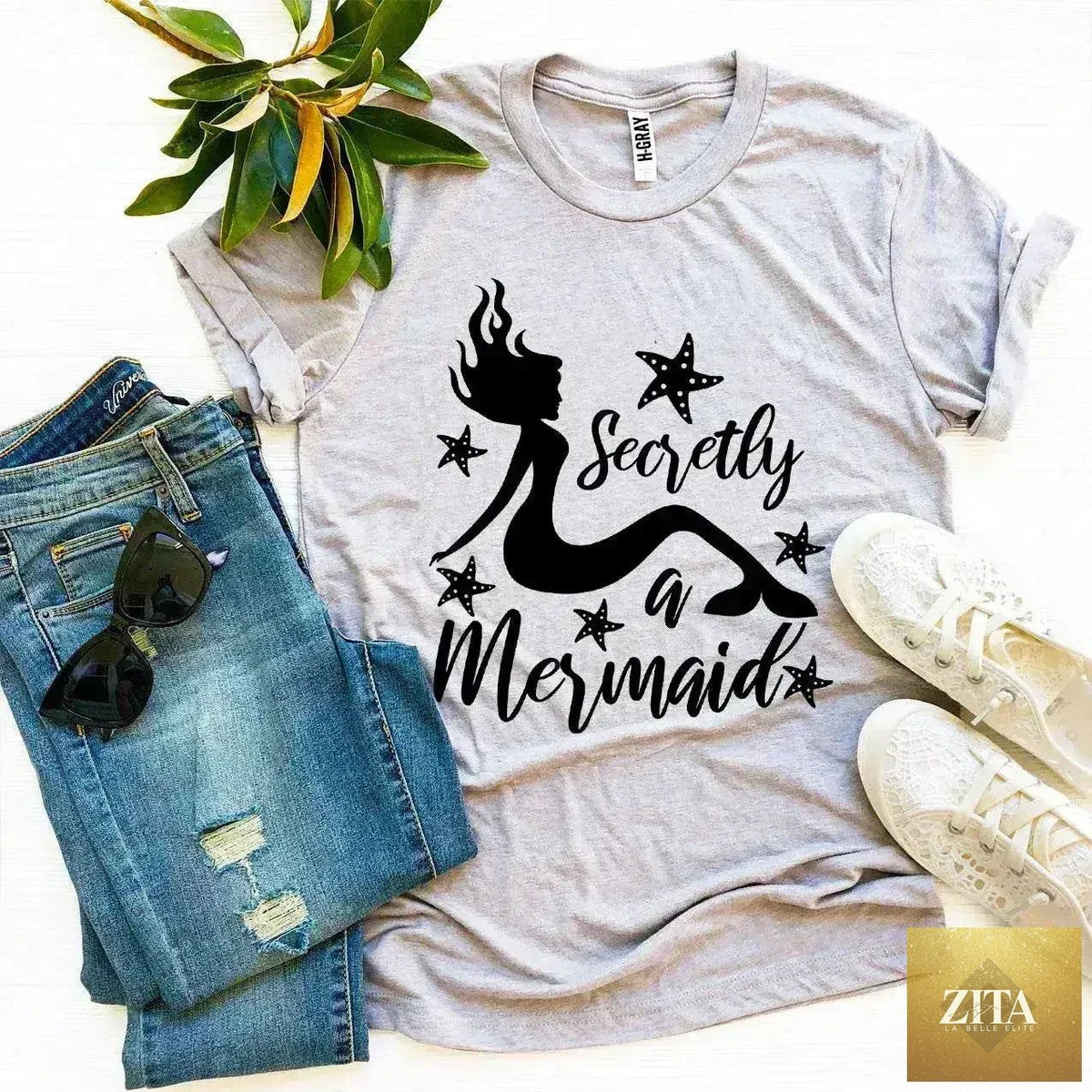 Femstylo Secretly a Mermaid T-shirt featuring a colorful mermaid graphic on a comfortable casual tee.