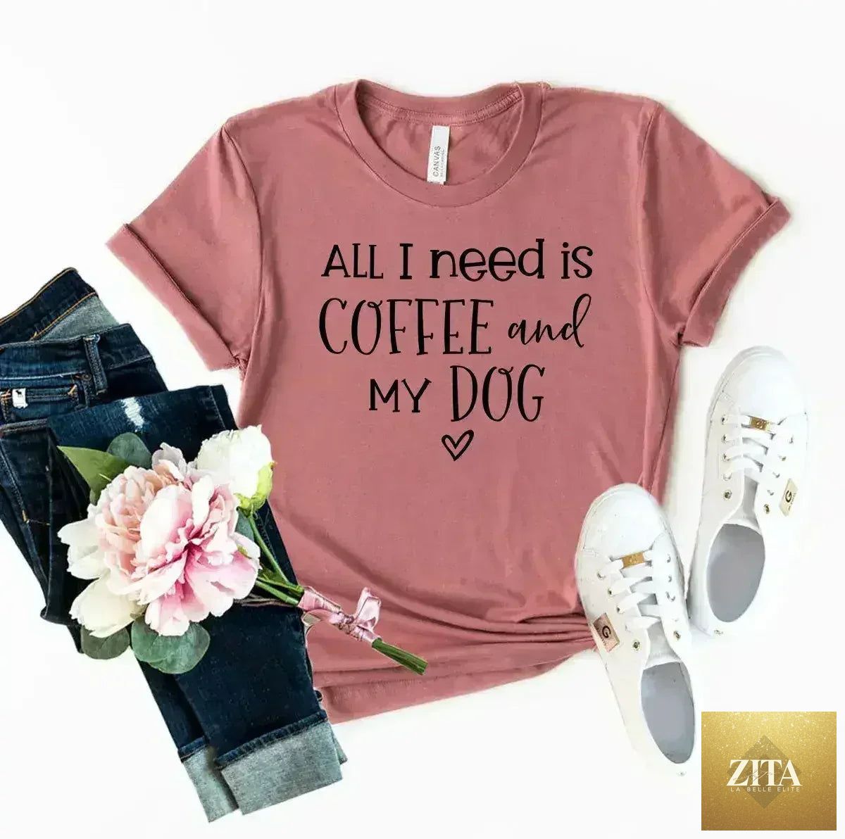 Femstylo printed T-shirt featuring the phrase "All I Need Is Coffee And My Dog" with a casual, comfortable design.