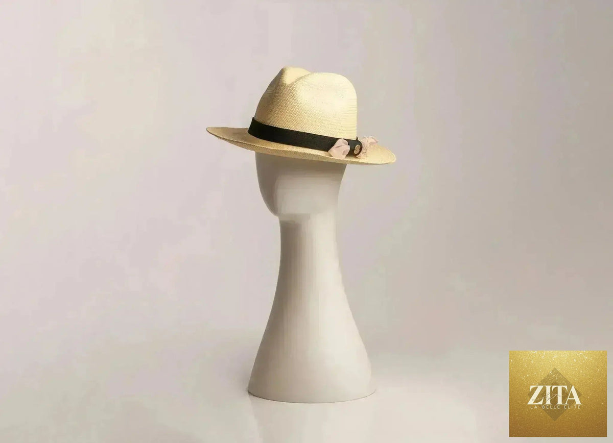 Handwoven Panama hat by Femstylo featuring Ecuadorian fino straw, unisex luxury fedora with wide brim and classic design.