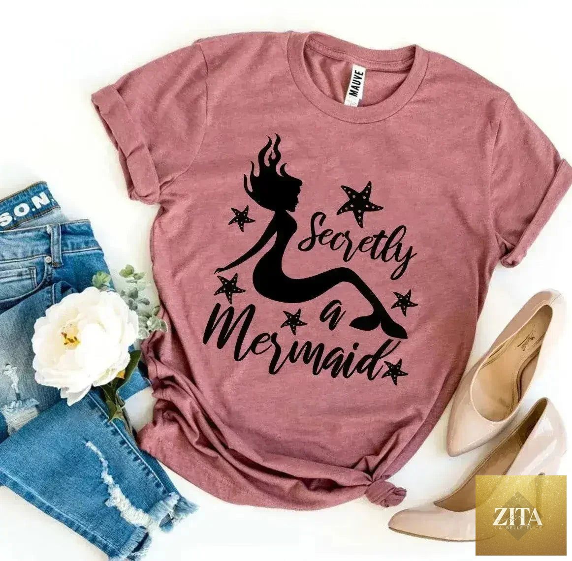 Femstylo Secretly a Mermaid T-shirt featuring a colorful mermaid design on soft fabric for a casual, stylish look.