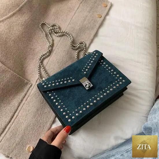 Elegant genuine leather Stevvex shoulder bag with chain rivets, designed for women and girls, featuring a stylish crossbody style.